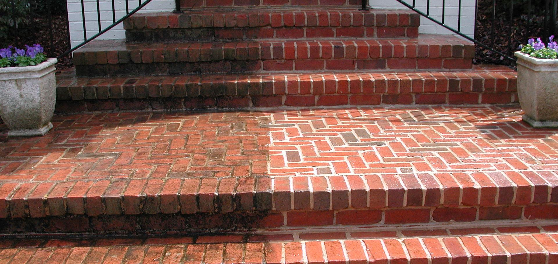 Before and after pressure washing of brick steps